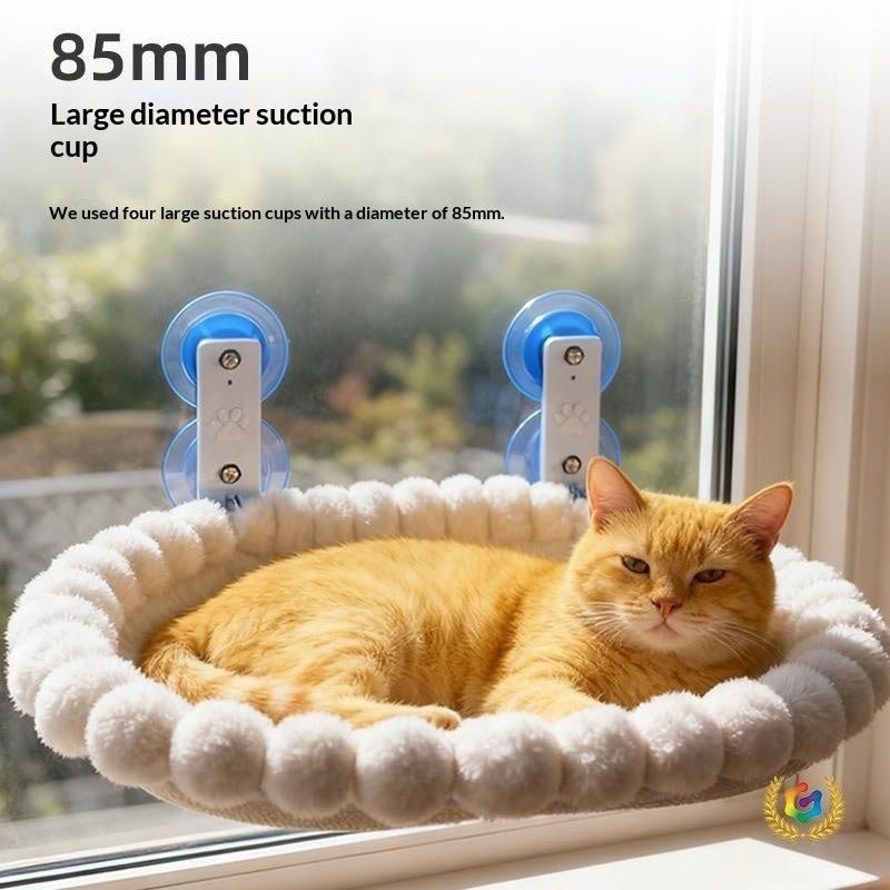 Folding cat balcony hammock mounted on a window with suction cups