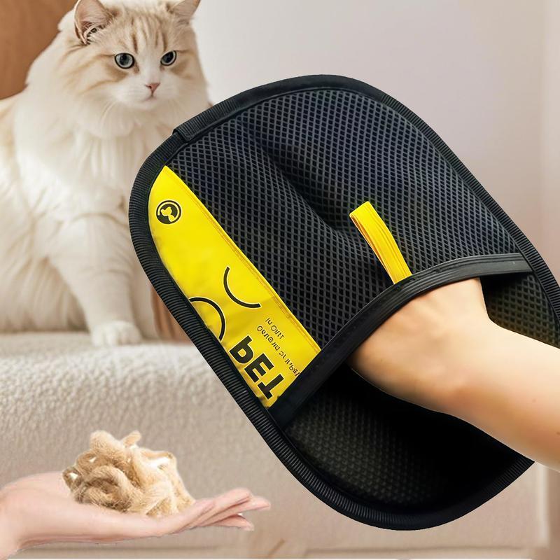 Pet grooming glove being used to deshed a dog's coat